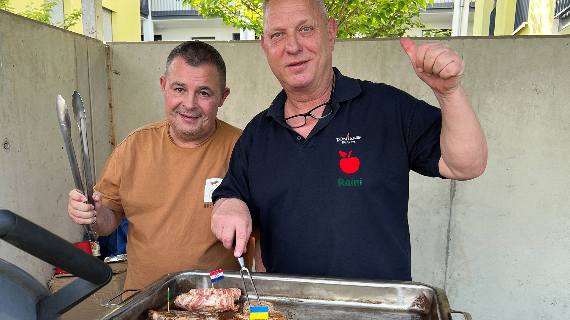 Barbecue Meister am Grill